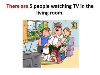 There are 5 peoplewatching TV in the living room.