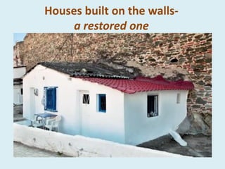 Houses built on the walls-
a restored one
 