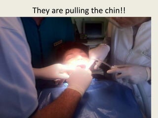 They are pulling the chin!! 
 