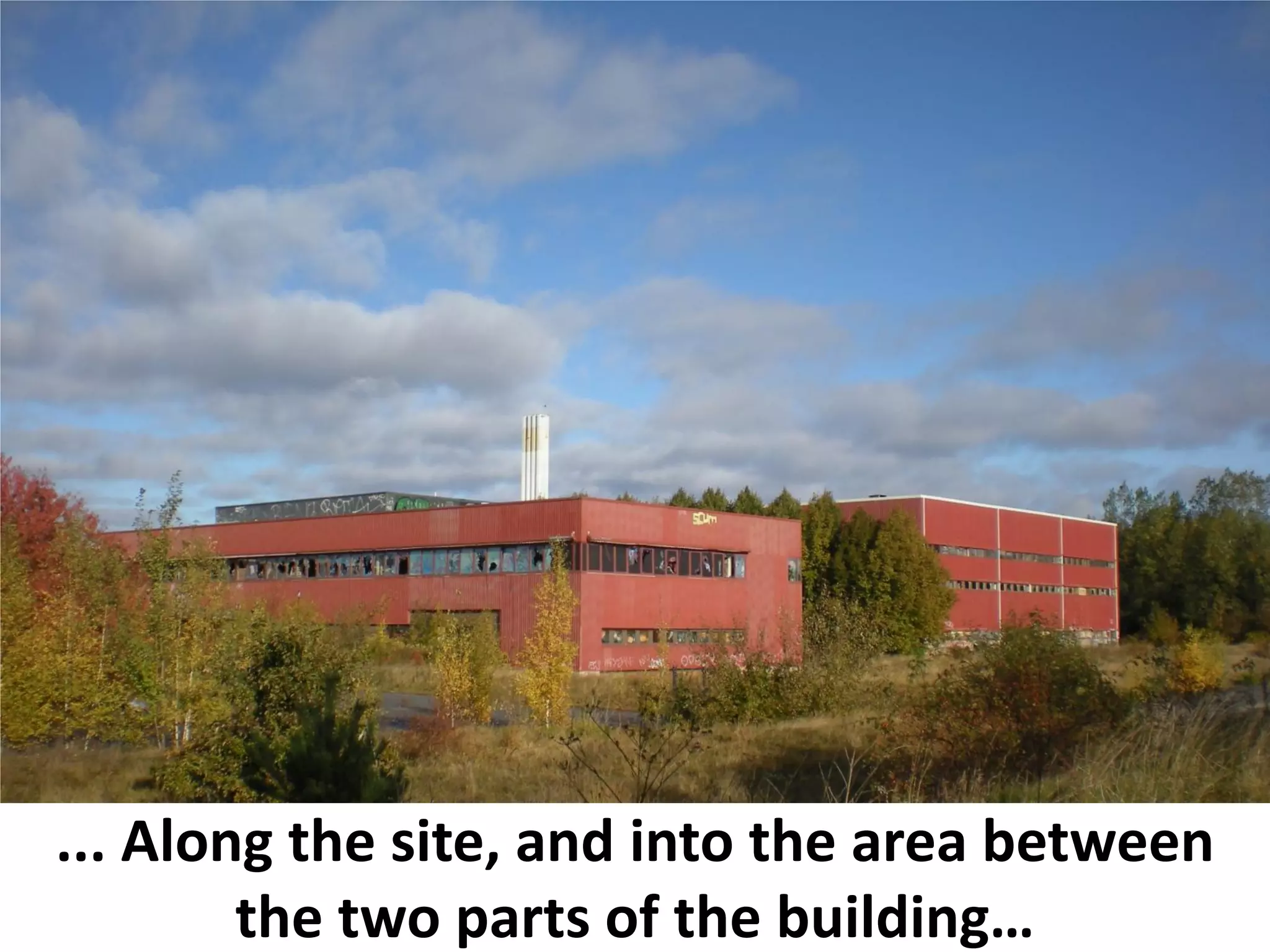 ... Along the site, and into the area between
        the two parts of the building…
 
