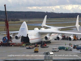 Loading process with cable-rolls with lowered front gear. A/c took off with 3hrs delay. 