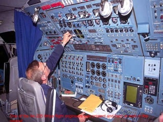 One of the An-225 Mriya flight engineers was present and hard at work in the 
cockpit . 
 