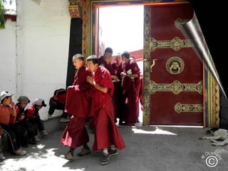 Tibetan pilgrims & prayer wheels