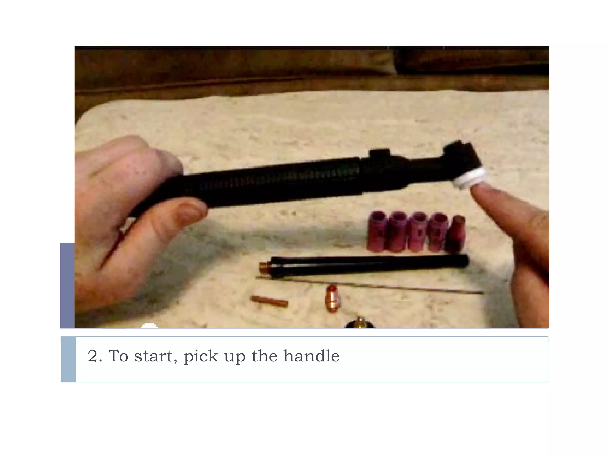 2. To start, pick up the handle