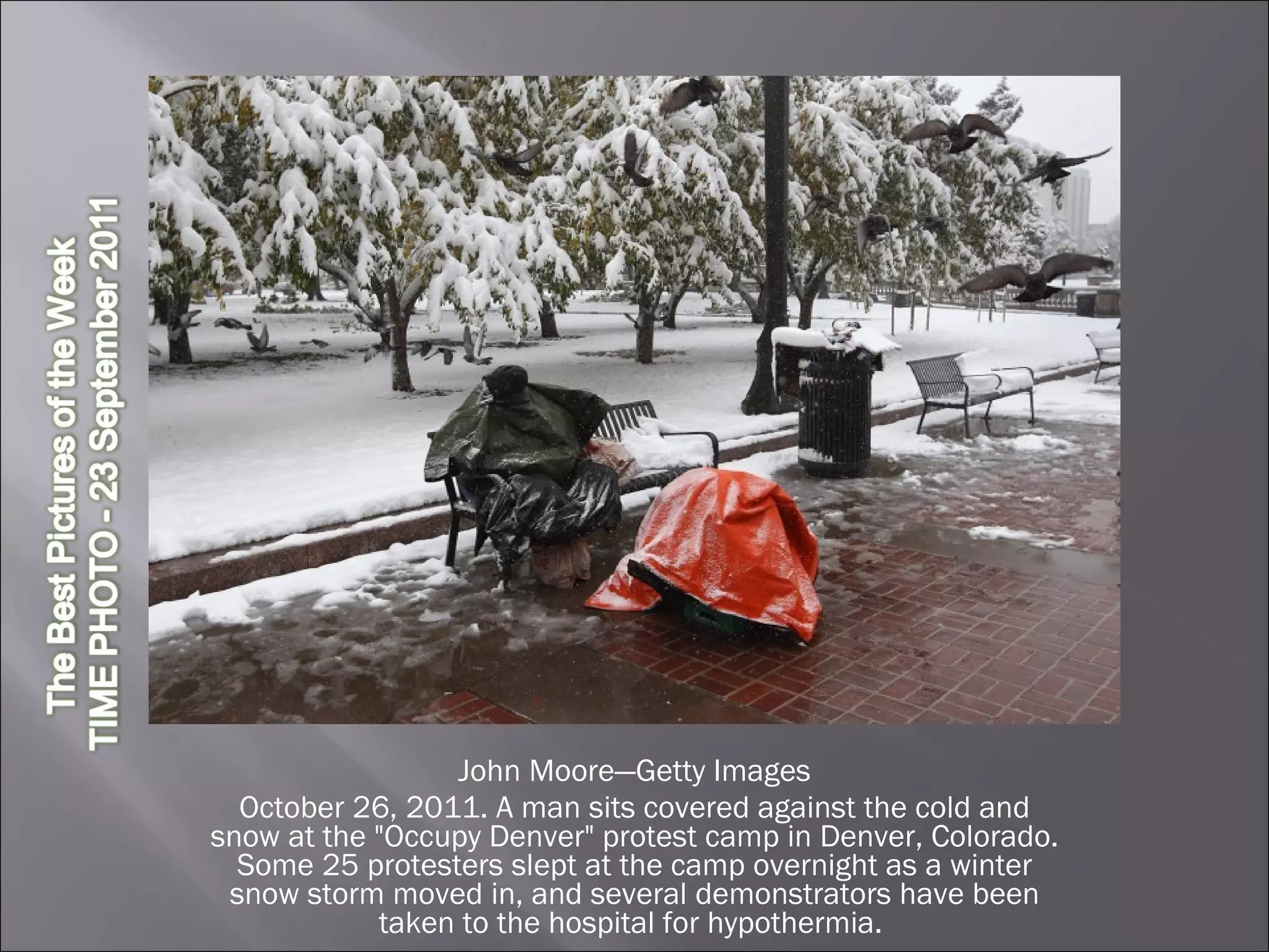 John Moore—Getty Images October 26, 2011. A man sits covered against the cold and snow at the "Occupy Denver" protest camp in Denver, Colorado. Some 25 protesters slept at the camp overnight as a winter snow storm moved in, and several demonstrators have been taken to the hospital for hypothermia.  