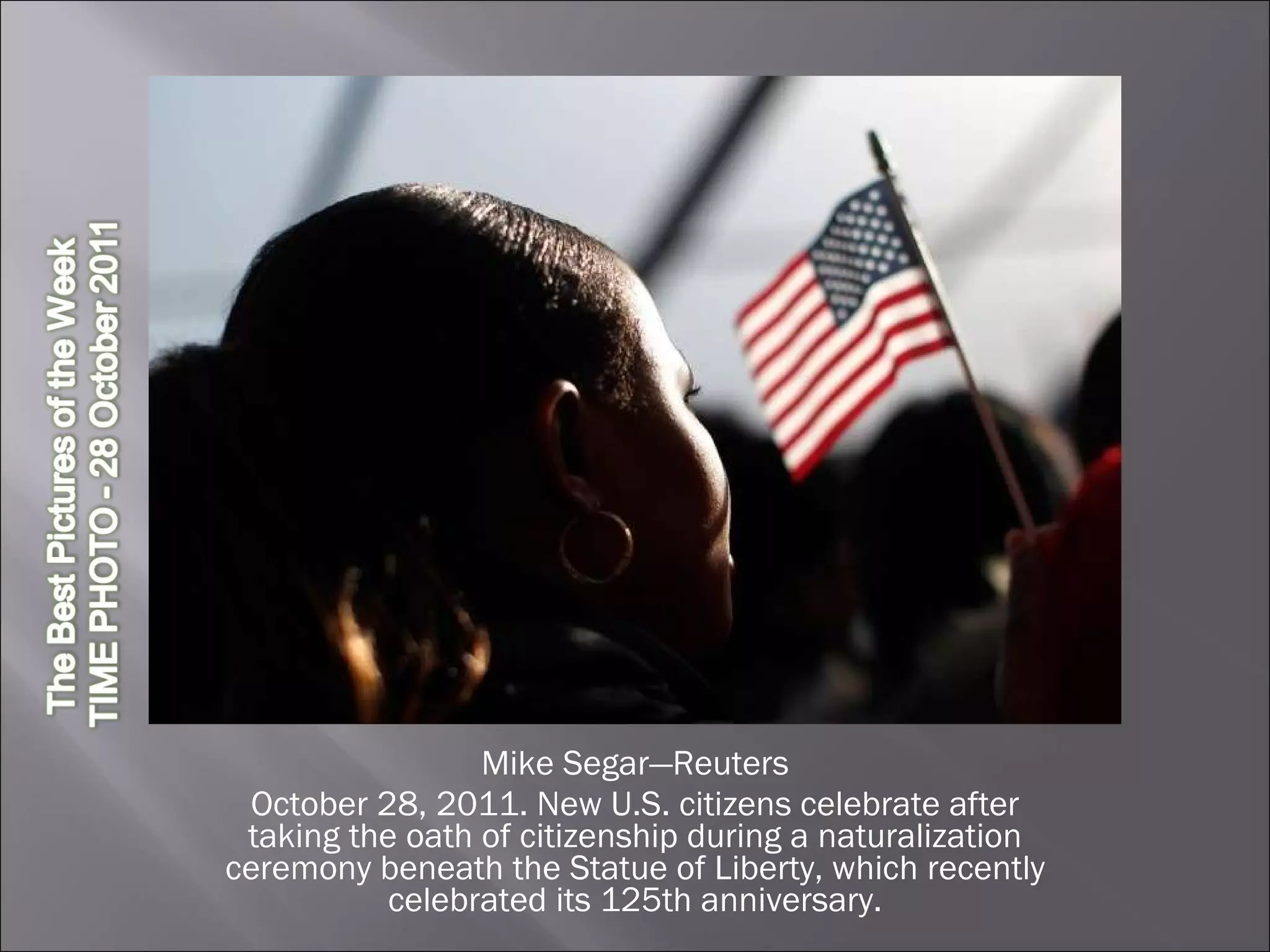 Mike Segar—Reuters October 28, 2011. New U.S. citizens celebrate after taking the oath of citizenship during a naturalization ceremony beneath the Statue of Liberty, which recently celebrated its 125th anniversary. 
