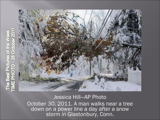 Jessica Hill—AP Photo October 30, 2011. A man walks near a tree down on a power line a day after a snow storm in Glastonbury, Conn. 