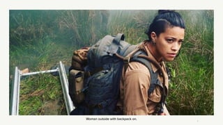 Woman outside with backpack on.
7
 