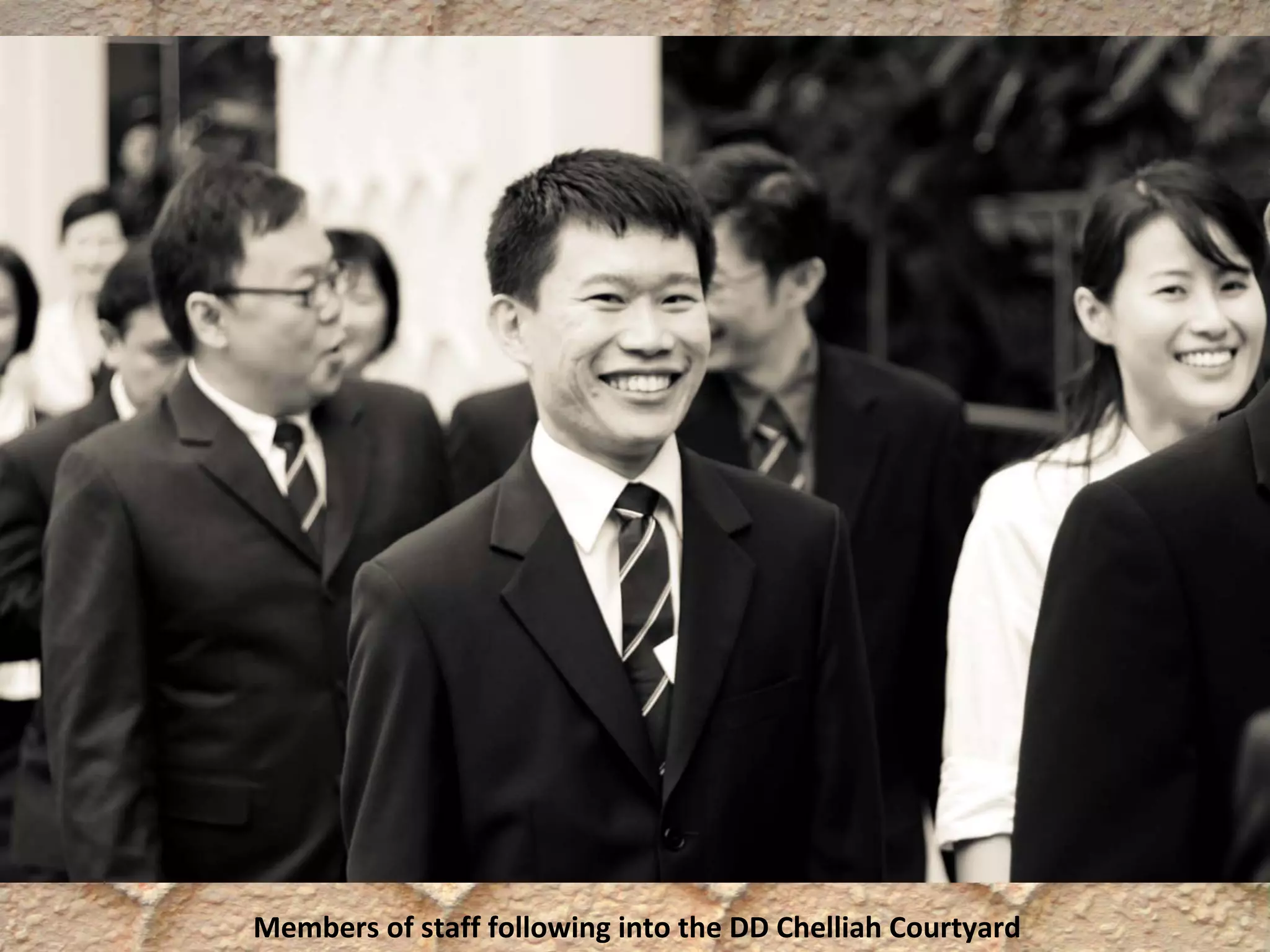 Members of staff following into the DD Chelliah Courtyard
 