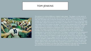 This picture is of Johnny Wilkinson, England rugby player. The player is in the centre of
the photograph as he would be the main focus in the rule of thirds as everyone wants to
hear from the player who scored the winning points. We know it is him from the big
number on his back which is in focus to prove that he is the main focus in the picture and
not the other subjects around him, this makes it a shallow focus in a wide angle shot. The
wide angle shows how popular the player is and how many people adore him making the
subject seem more impressive. However, the subject positioning is breaking the rules
slightly because for someone so impressive at this moment he isn’t showing it in his
posture. The subject is looking down which normally shows a sign of weakness, for
example, if you were taking a picture of a stereotypical ‘nerd’ you would have them
looking down to show they’re shy and timid. This subject is positioned like this because of
how tired he is after working so hard in the match he has just played. In addition, the
natural lighting used in the stadium is bright and all the colours from what the fans are
wearing shows that this is a happy moment. As the light is produced by the stadium lights
it can be changed to deflected the mood of the match for example, if they had lost the
stadium lights wouldn’t be as bright as they’re shown in this picture now. Has used a fast
shutter speed to reduce the motion blur caused by movement so it creates a clear shot.
The meaning of this photo is to show that Johnny Wilkinson is the hero as he scored the
goal and all the fans around him are admiring him as he has made their day.
 