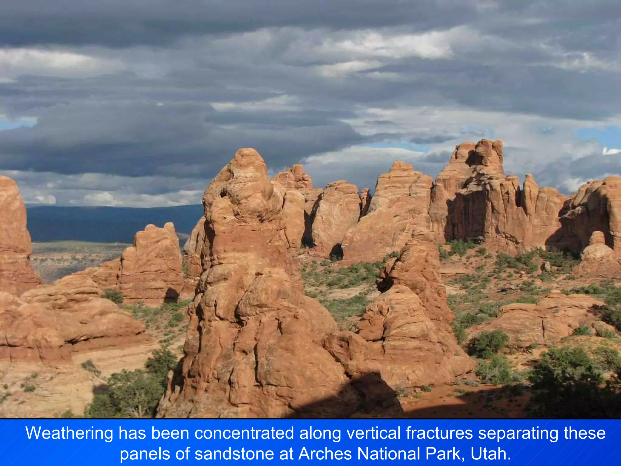 Weathering has been concentrated along vertical fractures separating these panels of sandstone at Arches National Park, Utah. 