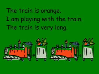 The train is orange. I am playing with the train. The train is very long. 