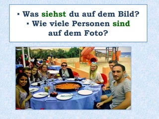 ▪ Was siehst du auf dem Bild?
▪ Wie viele Personen sind
auf dem Foto?
 