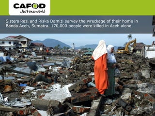 Sisters Razi and Riska Damizi survey the wreckage of their home in
Banda Aceh, Sumatra. 170,000 people were killed in Aceh alone.
 