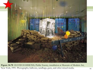 Figure 34-70 DAVID HAMMONS, Public Enemy, installation at Museum of Modern Art,
New York, 1991. Photographs, balloons, sandbags, guns, and other mixed media.     40
 
