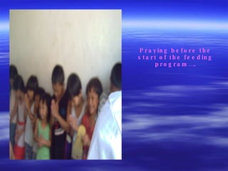 Praying before the start of the feeding program…. 