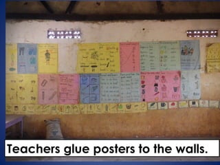 Teachers glue posters to the walls.
 