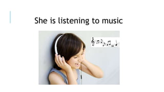 She is listening to music
 