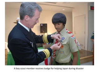 A boy scout member receives badge for helping Japan during disaster
 