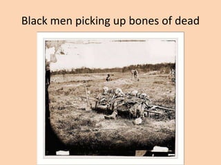 Black men picking up bones of dead
 