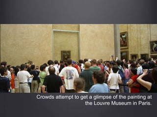 Crowds attempt to get a glimpse of the painting at
the Louvre Museum in Paris.
 