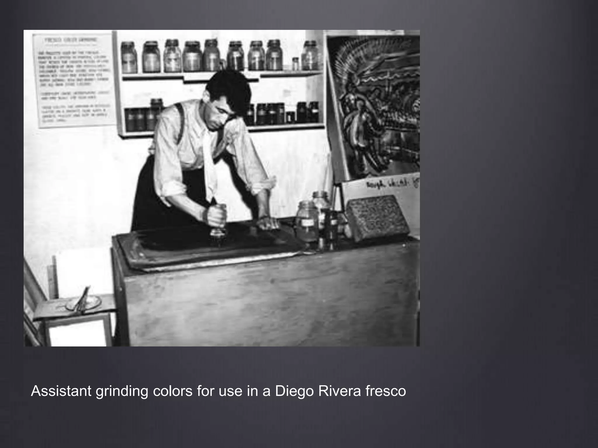 Assistant grinding colors for use in a Diego Rivera fresco
 