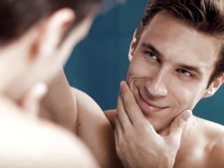 Man Looking in Mirror
 