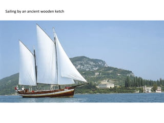 Sailing by an ancient wooden ketch 