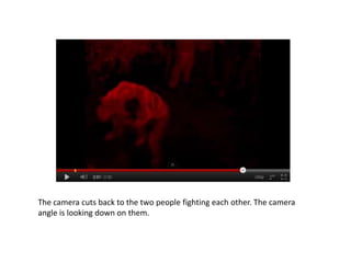 The camera cuts back to the two people fighting each other. The camera
angle is looking down on them.
 
