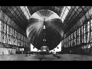 . O gigantesco hangar, ainda existente, tem 274 m
de comprimento, 58 m de altura e 58 de largura, e
é orientado no sentido norte-sul.
Os dirigíveis entravam pela porta sul, rebocados
pela torre, que era móvel e se deslocava sobre
trilhos.
 