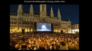 Crowd in the Rathausplatz viewing a ballet video
 