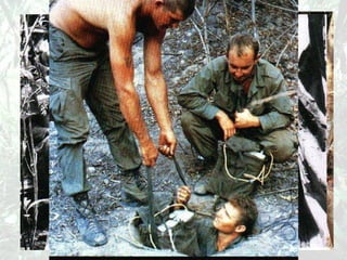 A NVA soldier reveals the entrance to a tunnel used as a hiding place by VC guerrillas 