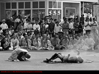 09:35 AM, June 11, 1963. Monks Pray Over Quang Duc’s charred body
 