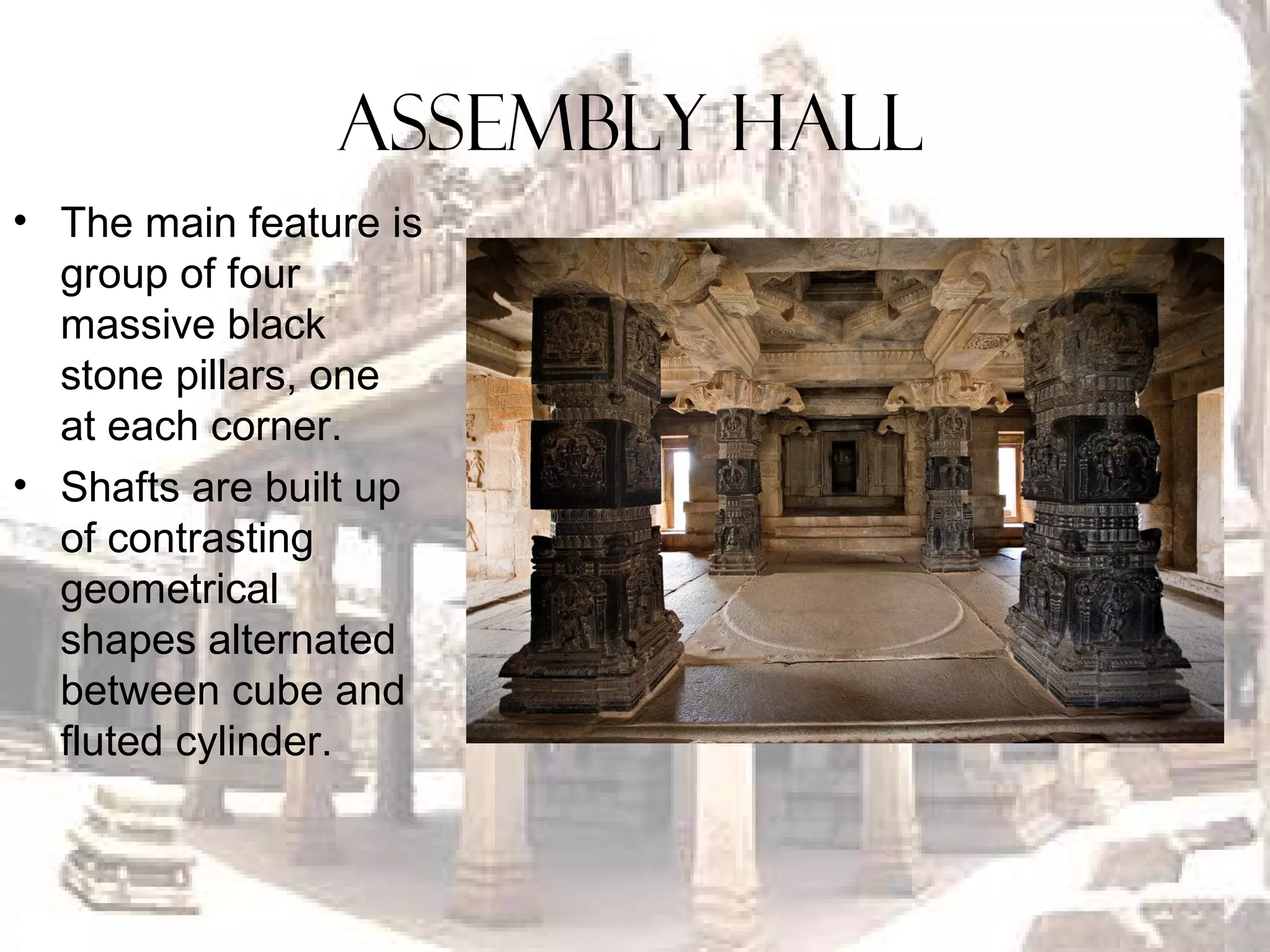 Assembly Hall
• The main feature is
group of four
massive black
stone pillars, one
at each corner.
• Shafts are built up
of contrasting
geometrical
shapes alternated
between cube and
fluted cylinder.
 