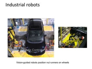 Industrial robots
Vision-guided robots position nut runners on wheels
 
