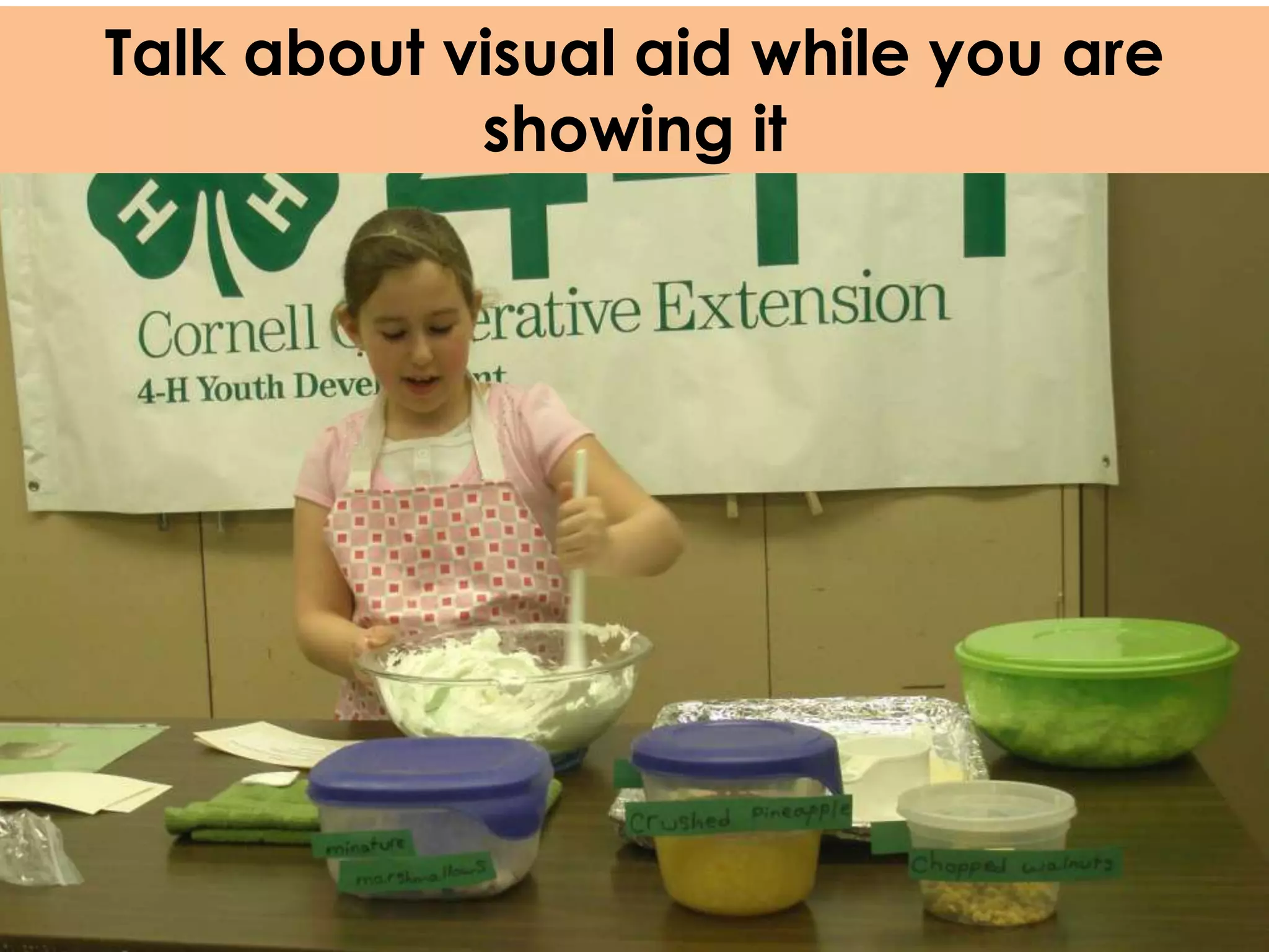 Talk about visual aid while you are
            showing it
 