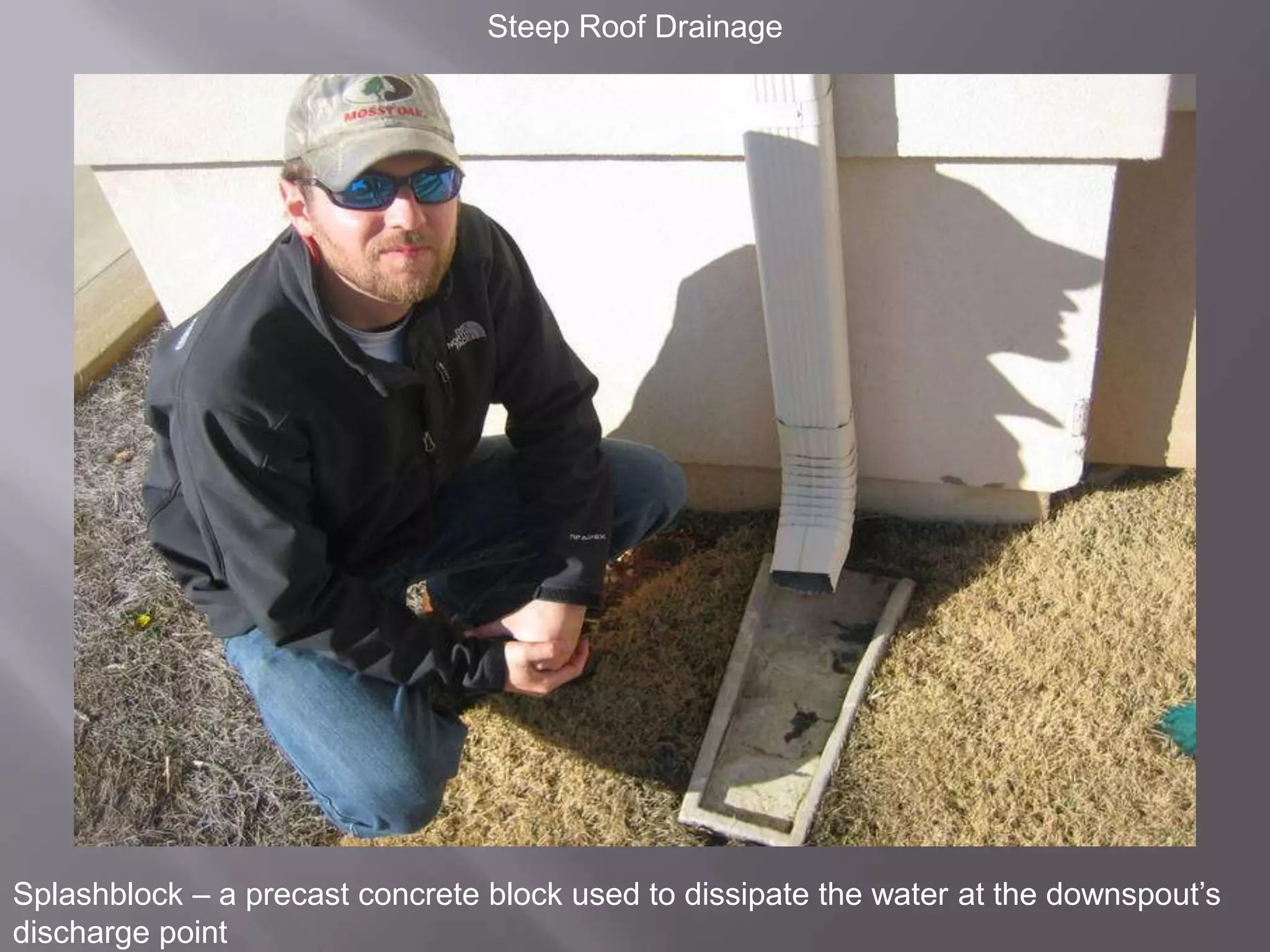 Steep Roof DrainageSplashblock – a precast concrete block used to dissipate the water at the downspout’s discharge point