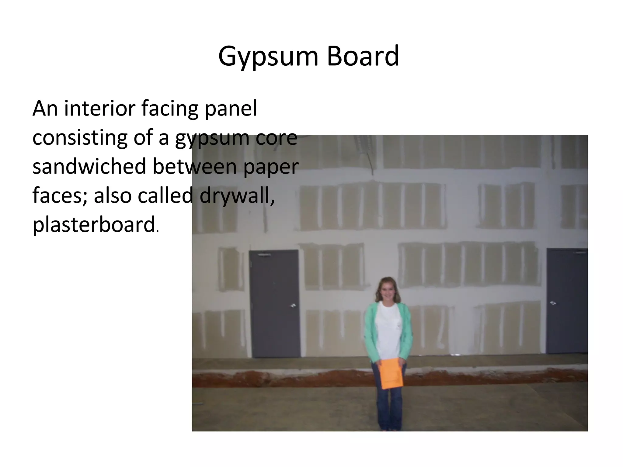 Gypsum Board An interior facing panel consisting of a gypsum core sandwiched between paper faces; also called drywall, plasterboard . 
