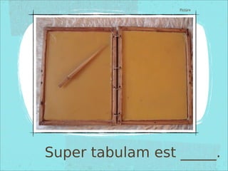 Super tabulam est _____.
Pictūra
 