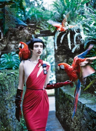 THE REAL
MACAW
Many of these looks
brilliantly channel
both the elegance and
the fearless quirk of
Schiaparelli c. 1934.
Lanvin jersey dress,
$4,590; select Saks
Fifth Avenue stores.
Earrings by Givenchy
Haute Couture by
Riccardo Tisci and Lulu
Frost. Brooches by
Sonia Rykiel, Miriam
Haskell, and Lulu
Frost. Gaspar gloves.
 