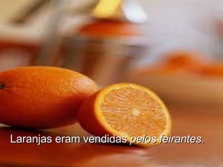 Laranjas eram vendidas  pelos feirantes. 