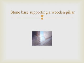 
Stone base supporting a wooden pillar
 