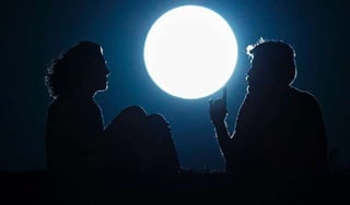 Perigee moon, also known as a super moon, in Madrid, Aug. 10,
2014. The phenomenon, which scientists call a 'perigee moon,'
occurs when the moon is near the horizon and appears larger
 