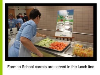 Farm to School carrots are served in the lunch line
 