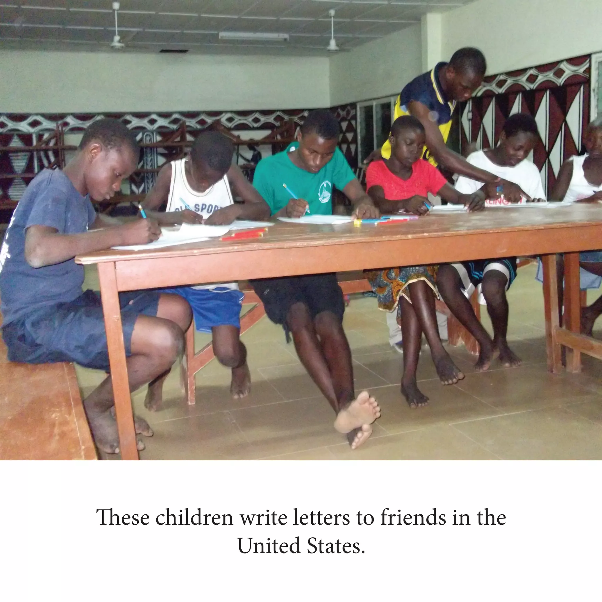 These children write letters to friends in the
United States.