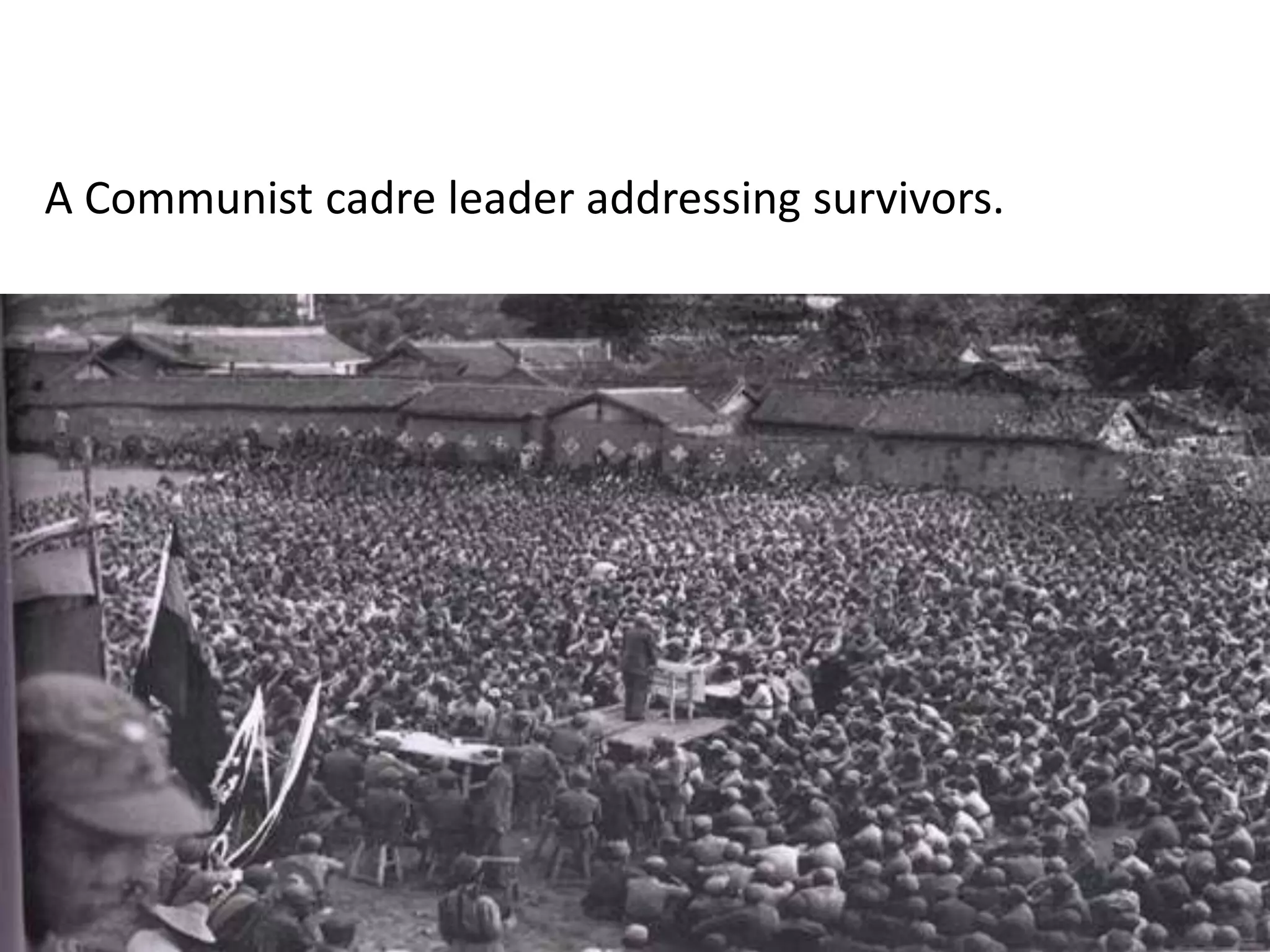 A Communist cadre leader addressing survivors.
 