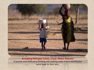 Breidjing Refugee Camp, Chad: Water BearersA woman and child carry drinking and cooking water from a distribution point back to their tent.