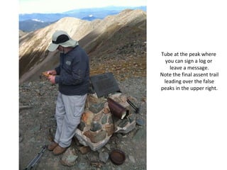 Tube at the peak where  you can sign a log or  leave a message. Note the final assent trail leading over the false peaks in the upper right. 