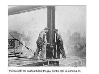 Please note the scaffold board the guy on the right is standing on.
 