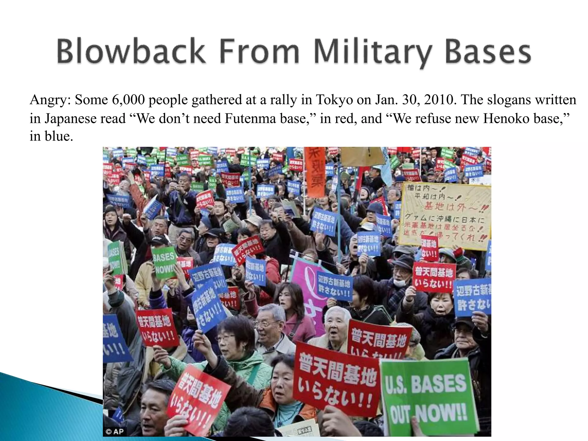 Angry: Some 6,000 people gathered at a rally in Tokyo on Jan. 30, 2010. The slogans written
in Japanese read “We don’t need Futenma base,” in red, and “We refuse new Henoko base,”
in blue.
 